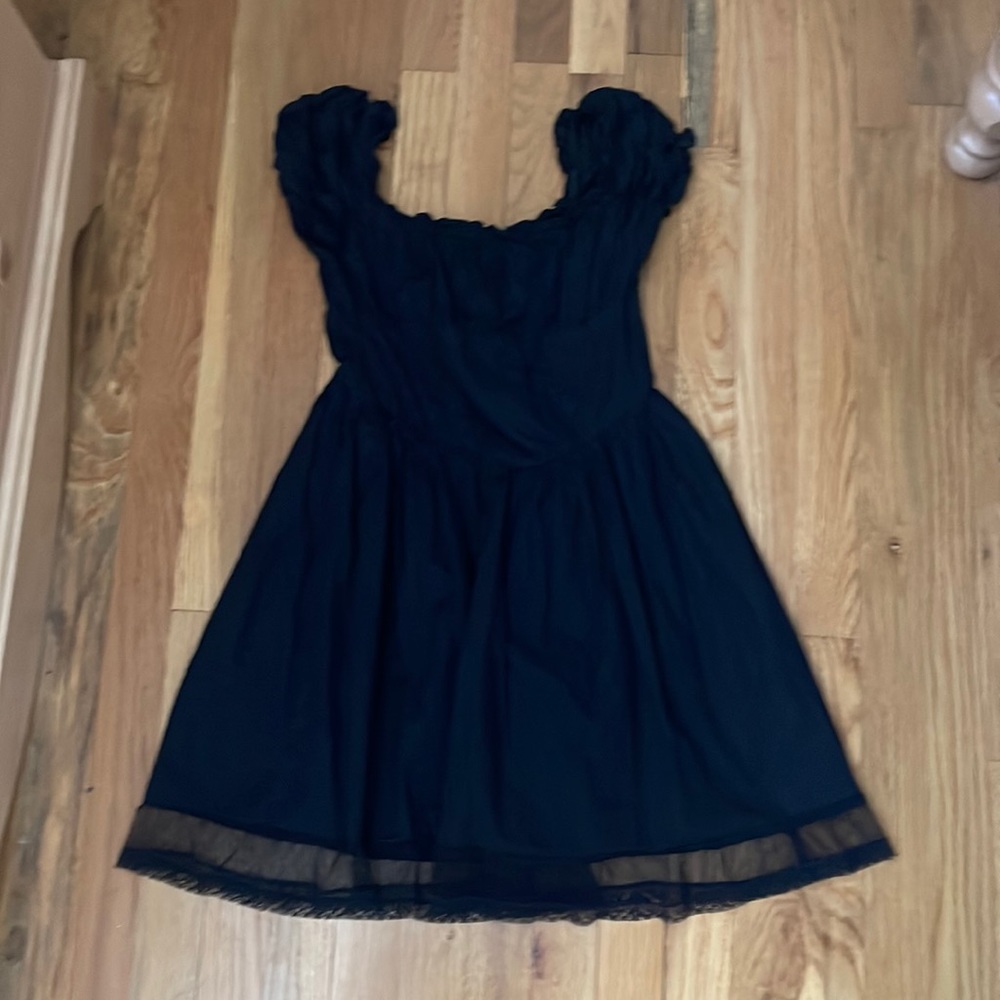 black dress with laced bottom trim